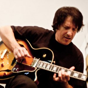 Marcelo Berestovoy playing guitar
